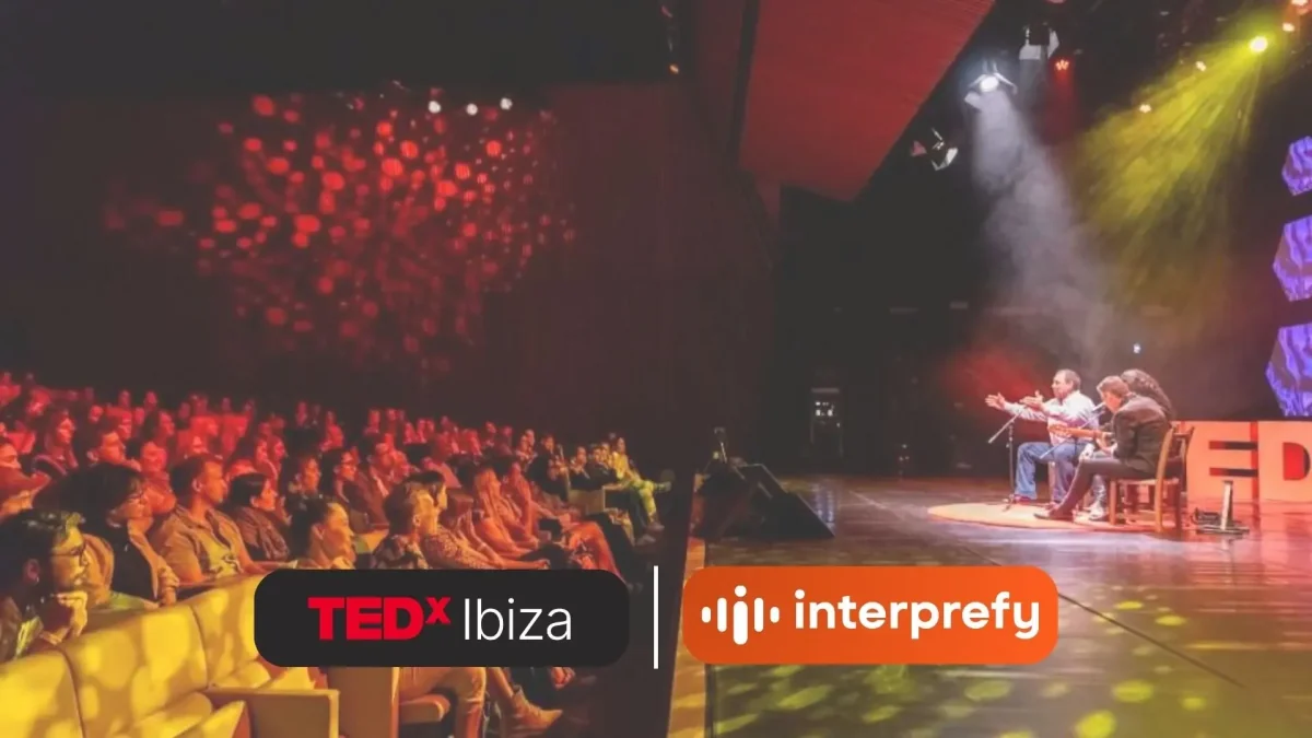 ステージ上の対談と両組織のブランド表示を組み合わせた、InterprefyのTEDxIbiza事例の表紙画像。